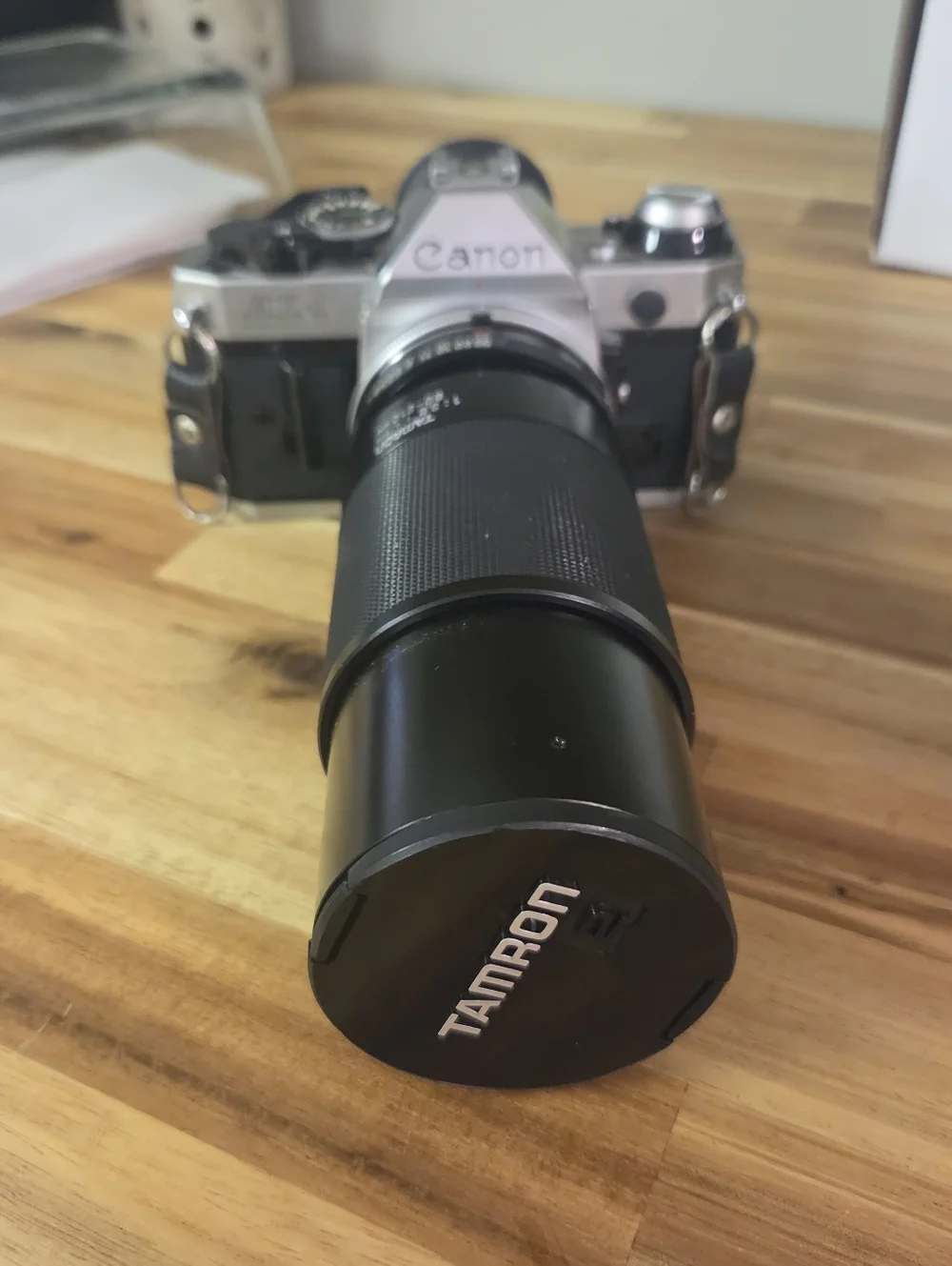 Canon Silver SLR Camera with Black Tamron 80-210mm Lens